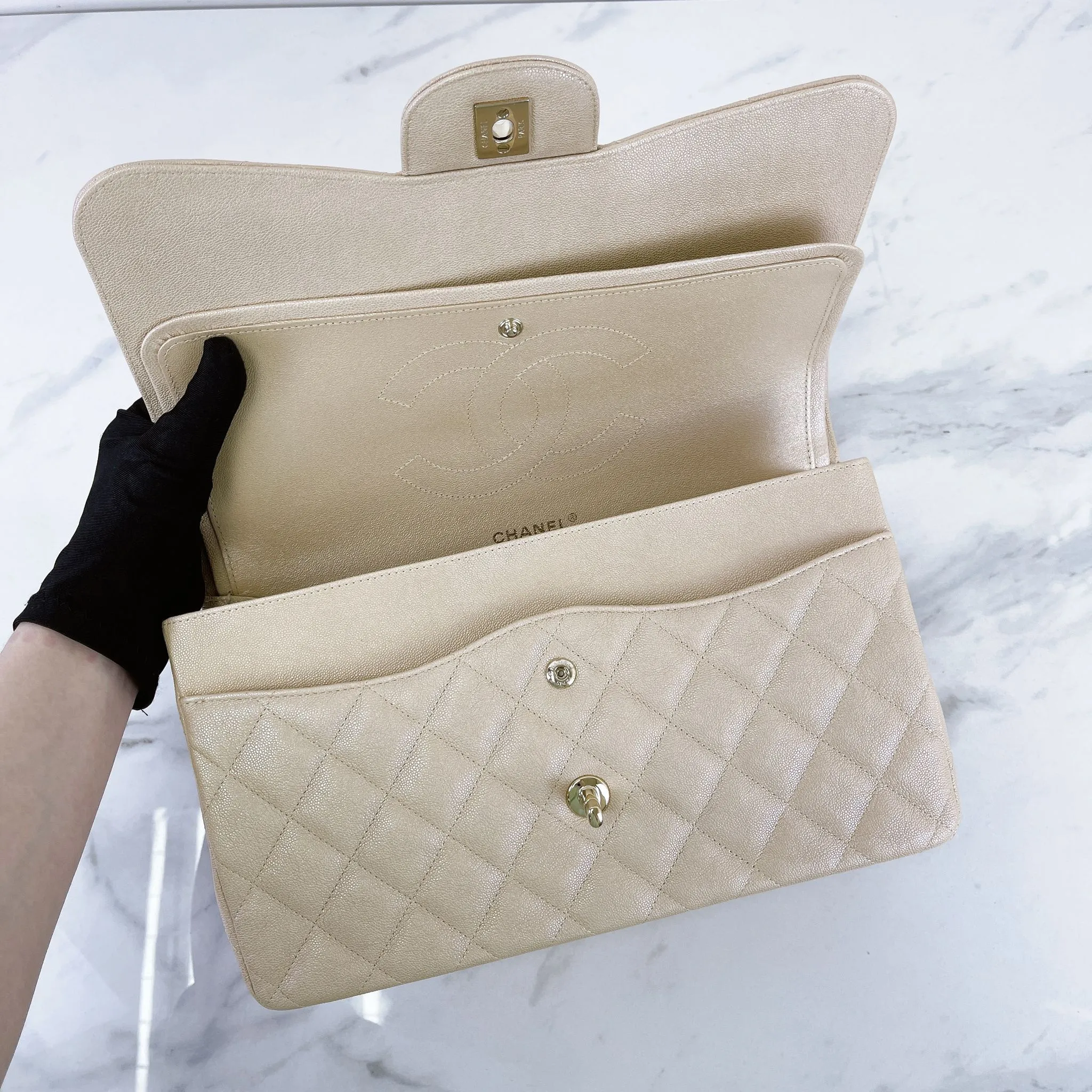 Chanel Timeless Classic Jumbo Double Flap, Iridescent Beige Caviar Gold-tone Hardware
