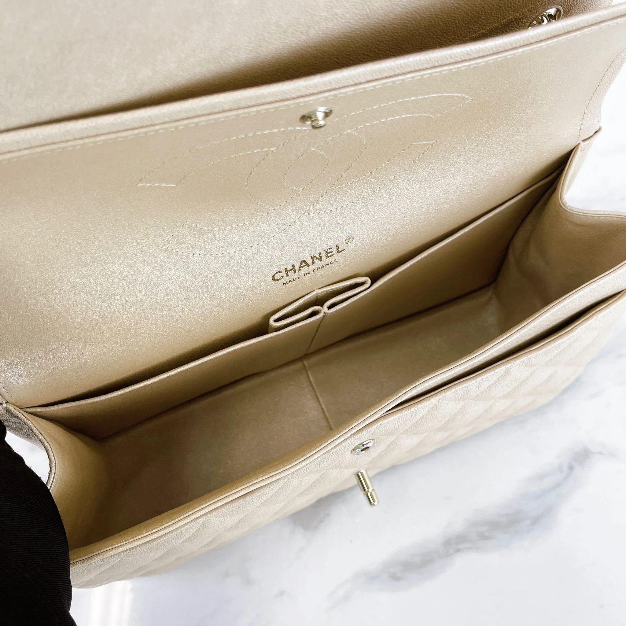 Chanel Timeless Classic Jumbo Double Flap, Iridescent Beige Caviar Gold-tone Hardware