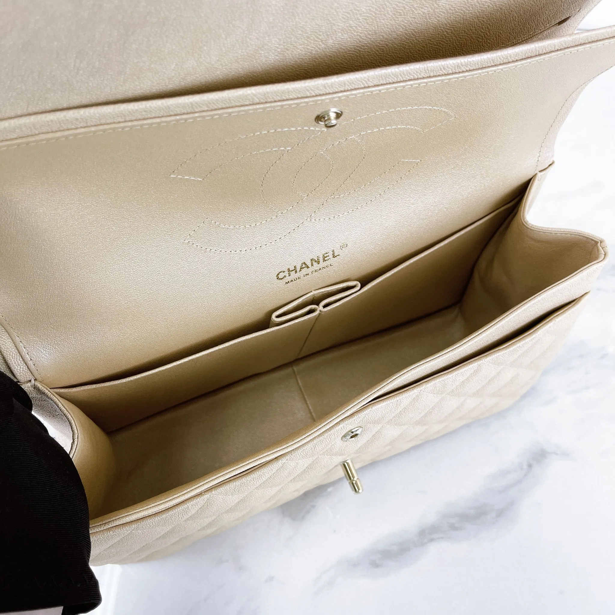 Chanel Timeless Classic Jumbo Double Flap, Iridescent Beige Caviar Gold-tone Hardware