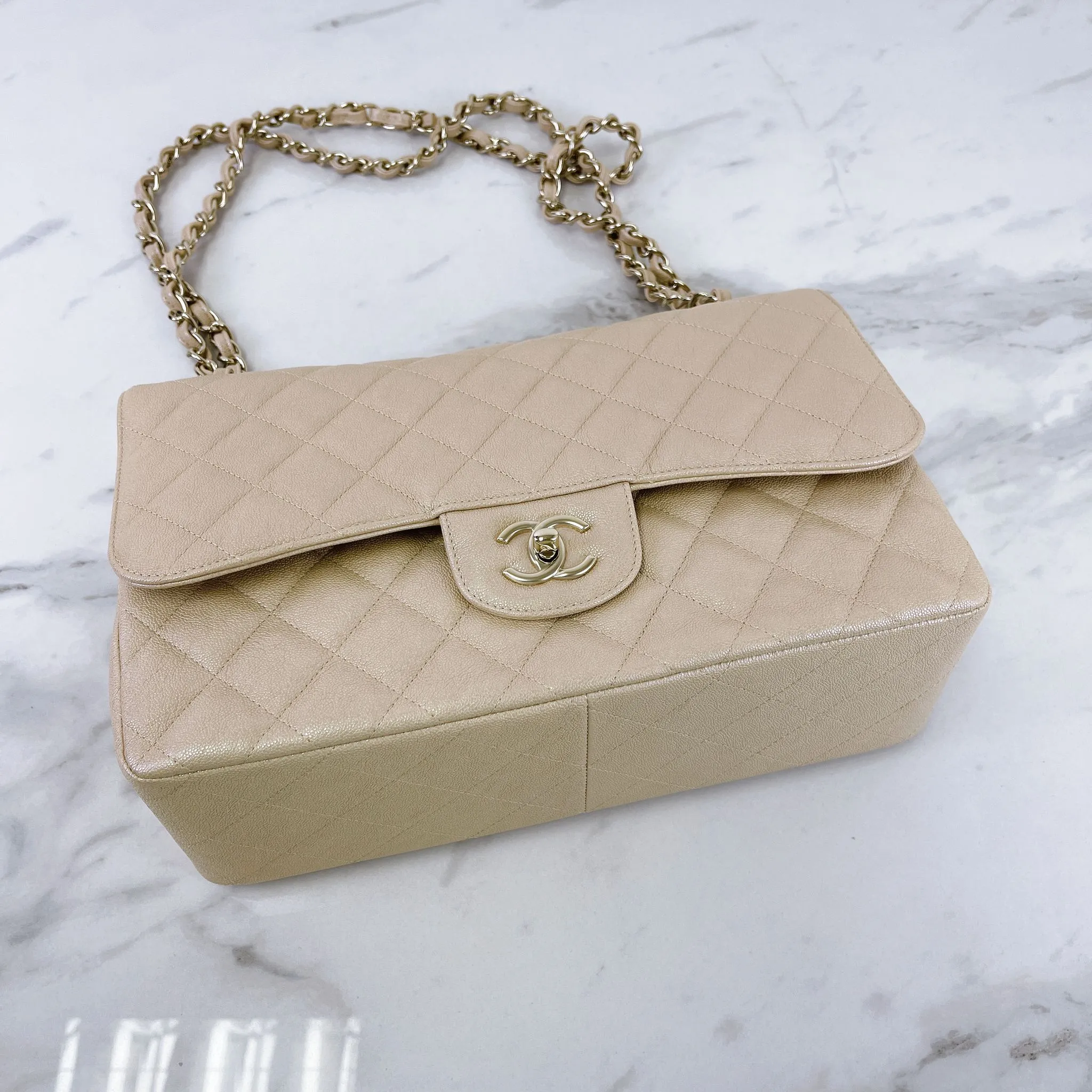 Chanel Timeless Classic Jumbo Double Flap, Iridescent Beige Caviar Gold-tone Hardware