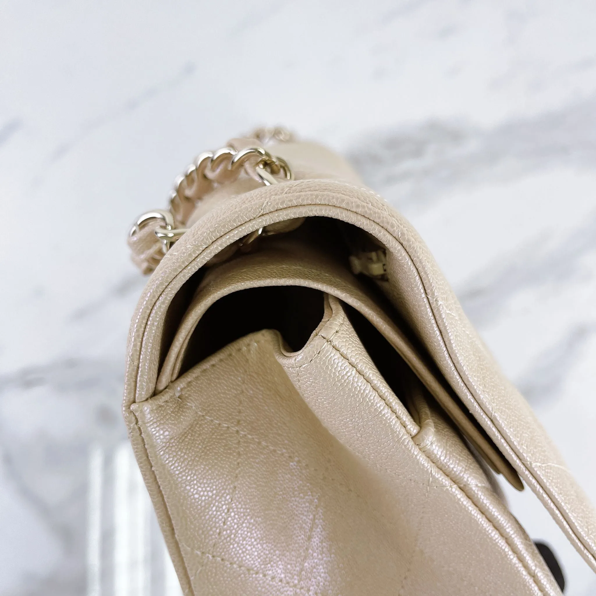 Chanel Timeless Classic Jumbo Double Flap, Iridescent Beige Caviar Gold-tone Hardware