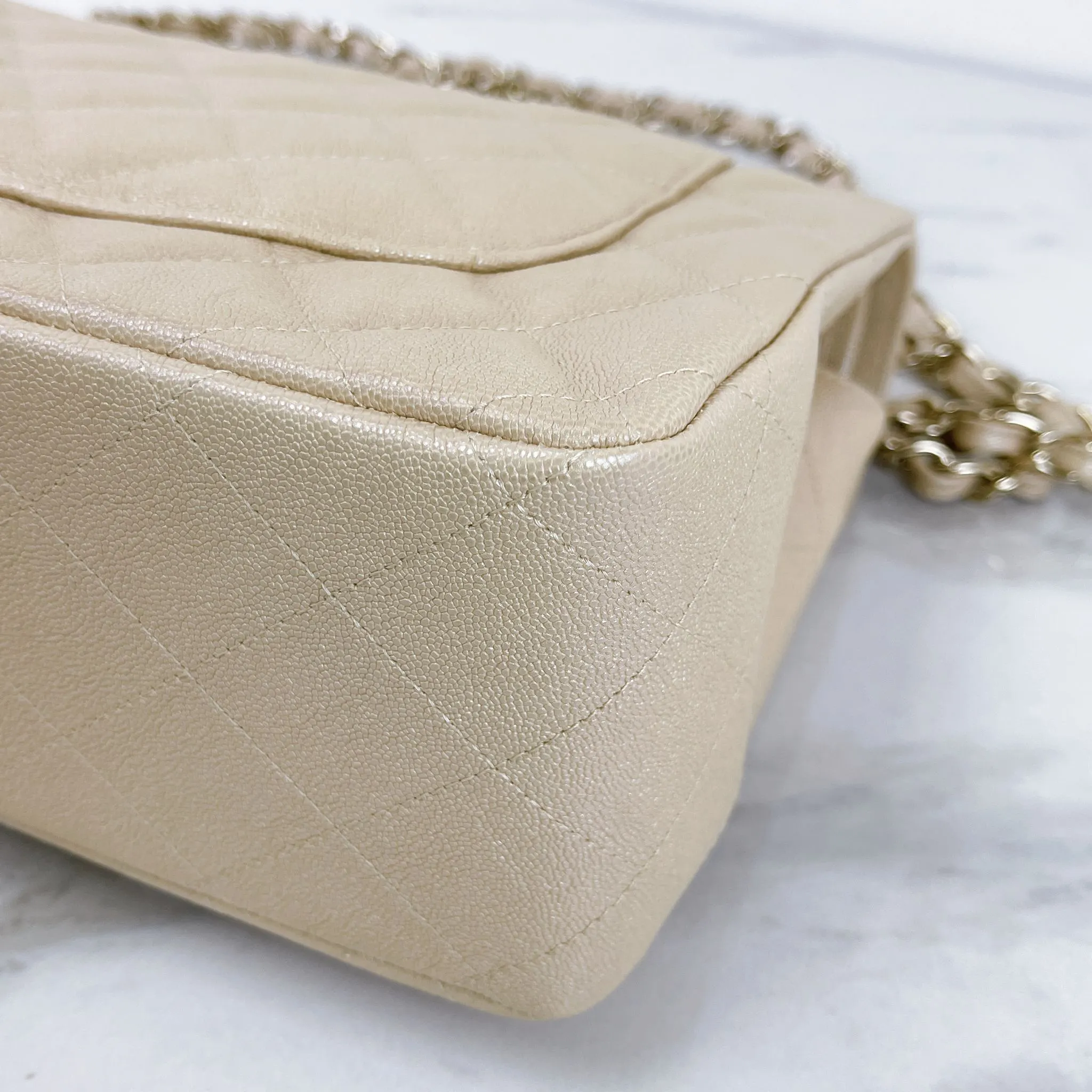 Chanel Timeless Classic Jumbo Double Flap, Iridescent Beige Caviar Gold-tone Hardware