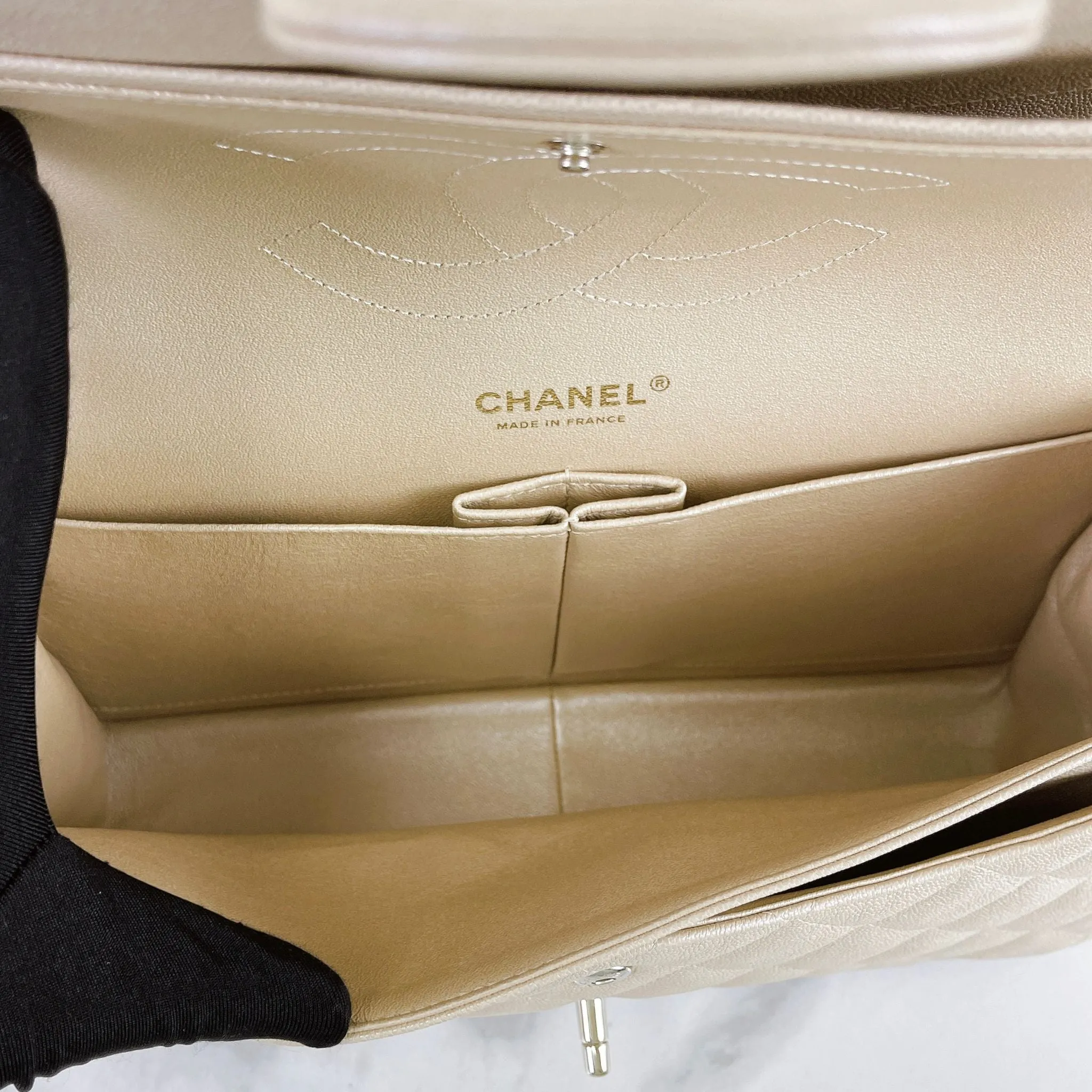 Chanel Timeless Classic Jumbo Double Flap, Iridescent Beige Caviar Gold-tone Hardware