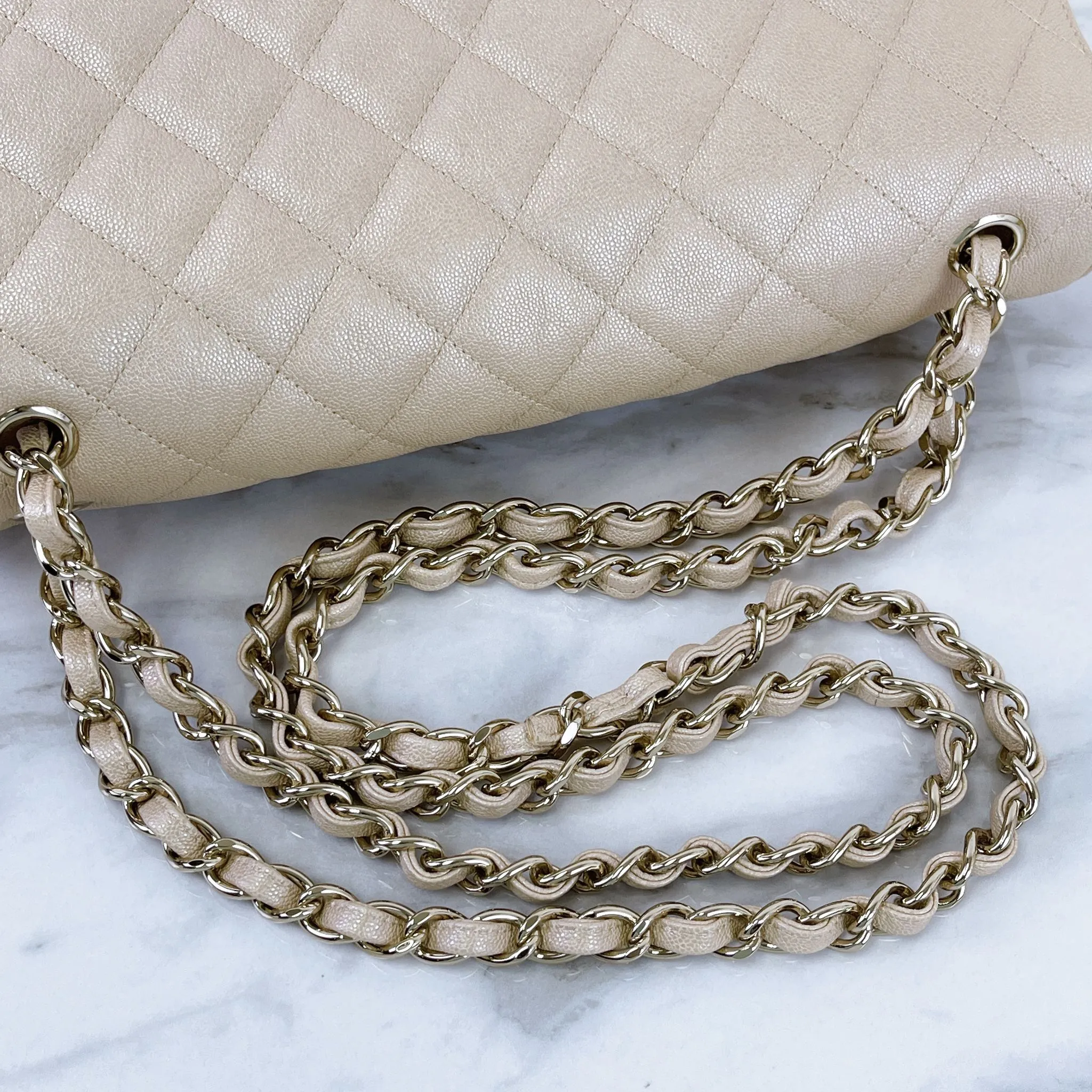 Chanel Timeless Classic Jumbo Double Flap, Iridescent Beige Caviar Gold-tone Hardware