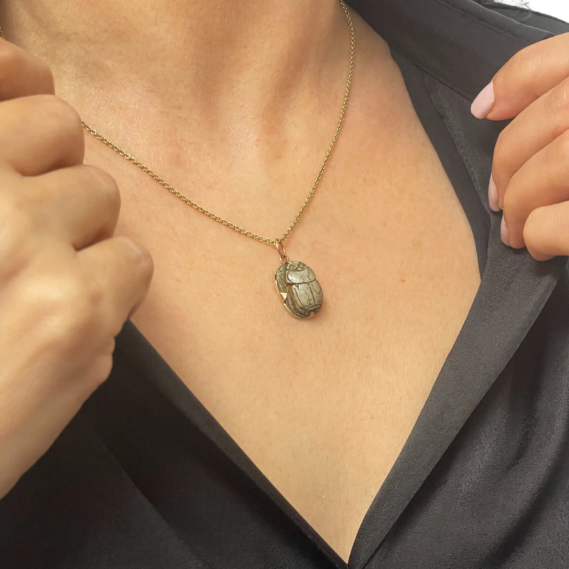 scarab (beetle) charm in 18k gold prong setting